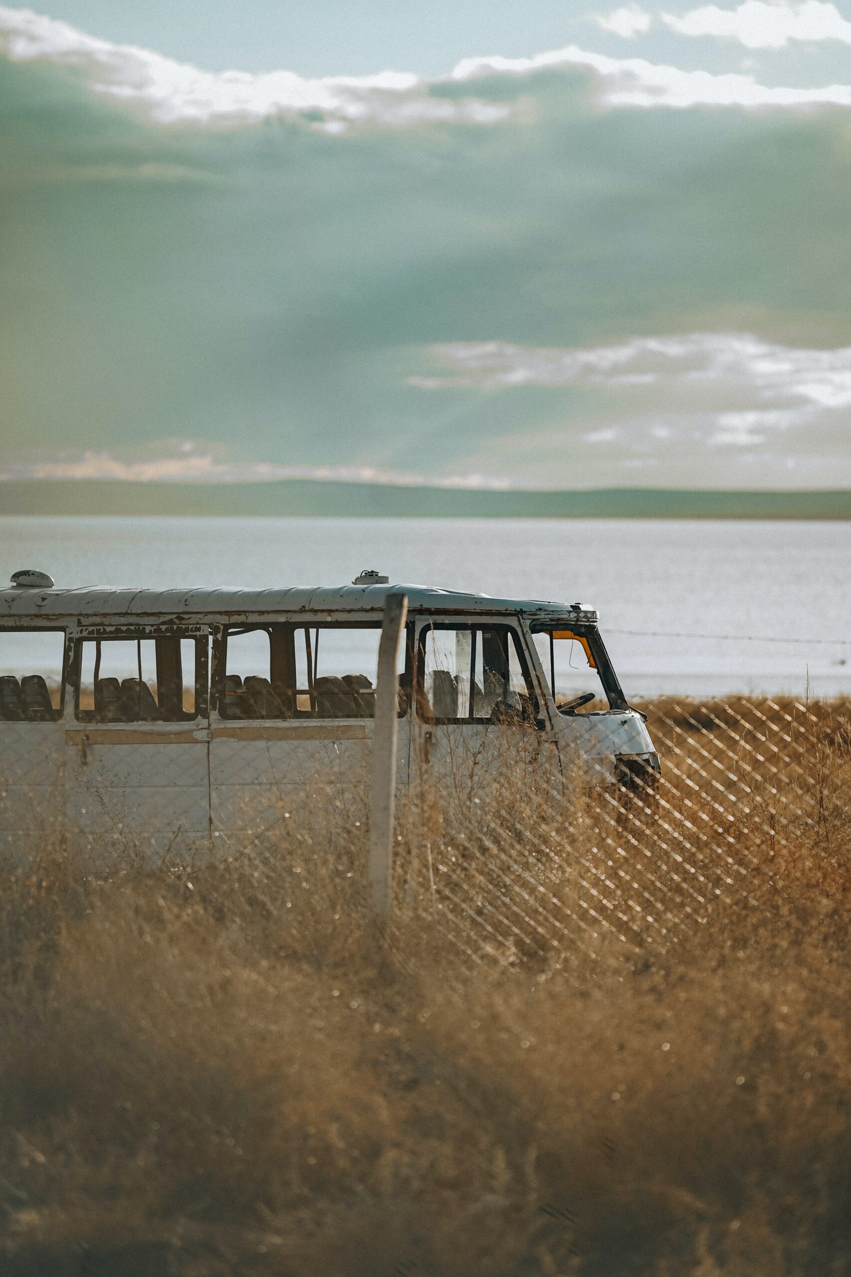 Photo by Emir Anık: https://www.pexels.com/photo/weathered-abandoned-bus-parked-by-a-seaside-10723523/