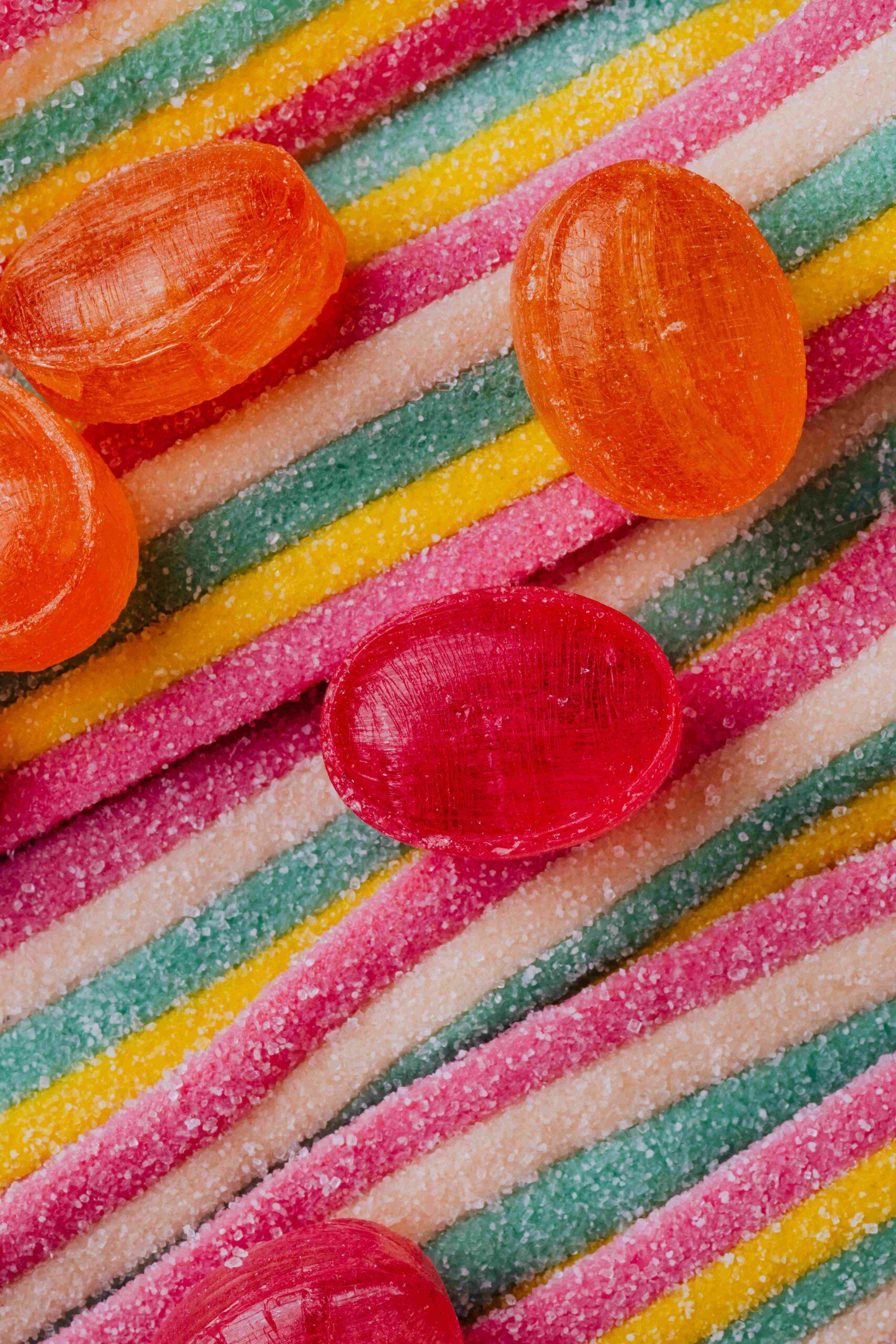 https://www.pexels.com/photo/close-up-photo-of-coloful-sweet-candies-and-gummies-4016507/