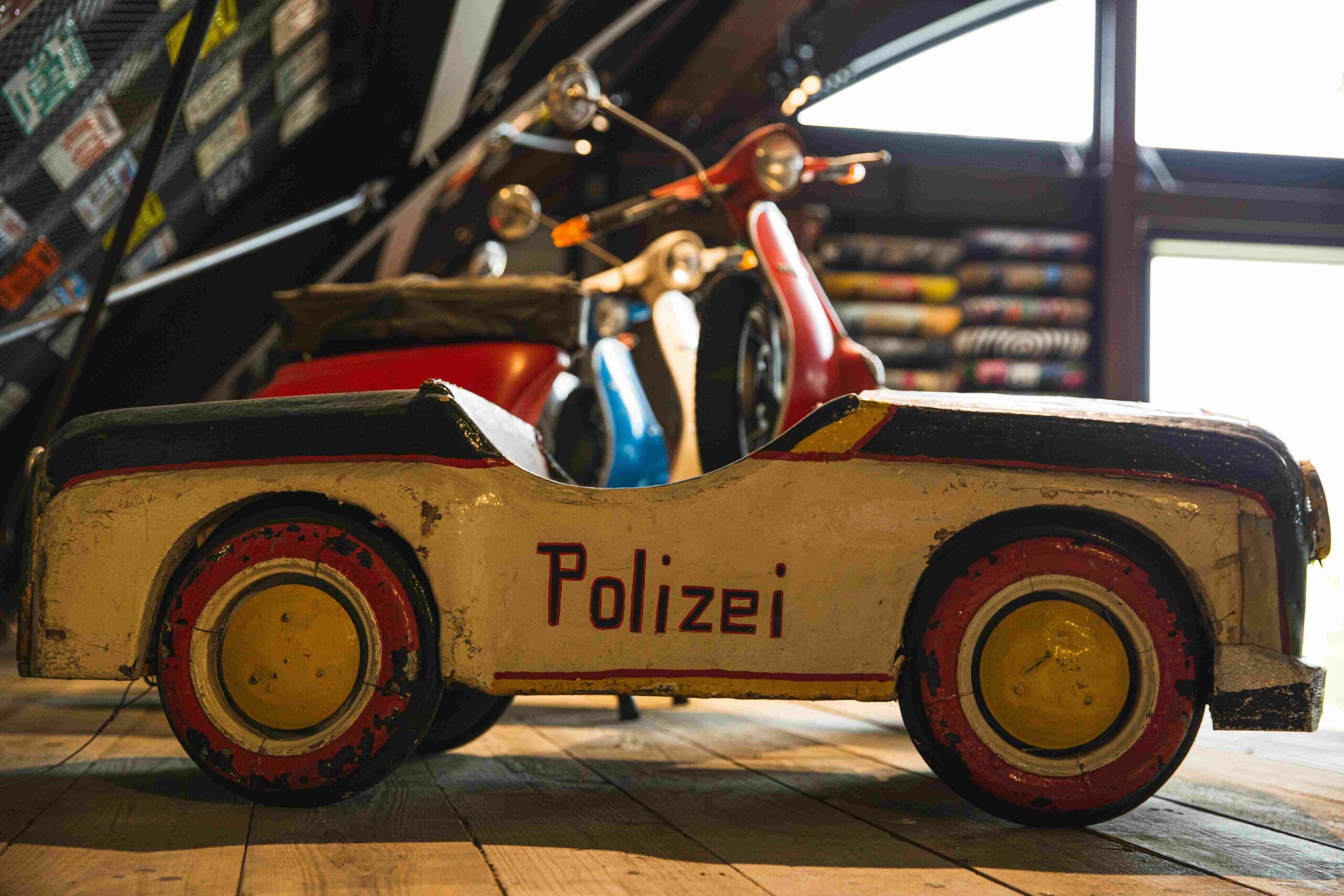 Photo by Ryutaro Tsukata: https://www.pexels.com/photo/aged-toy-police-car-on-wooden-shelf-5472259/