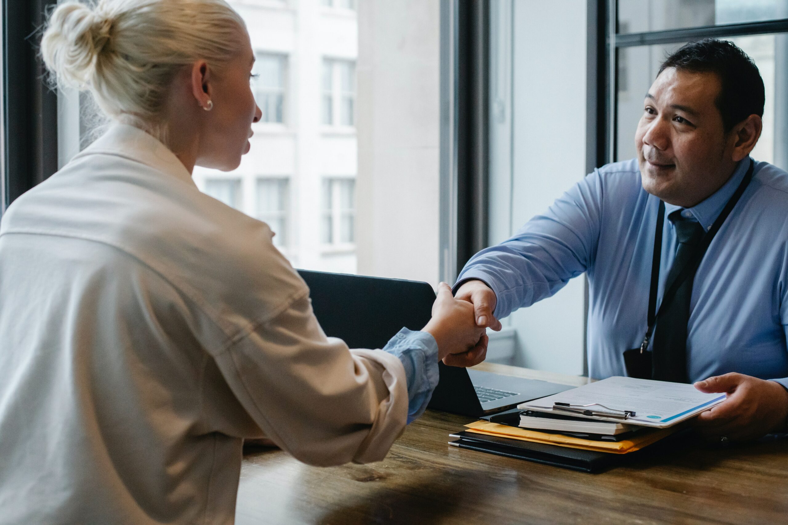 Photo by Sora Shimazaki: https://www.pexels.com/photo/ethnic-businessman-shaking-hand-of-applicant-in-office-5668859/